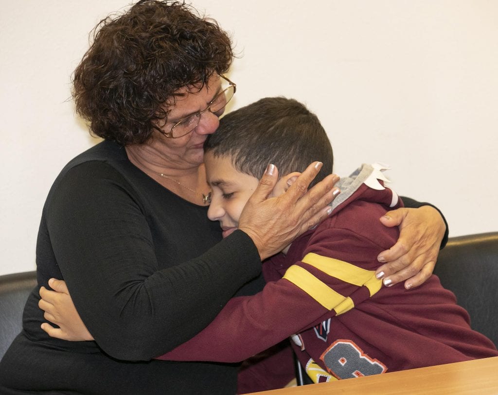 Community with a Heart helps mom, ill son secure a home Central(02)